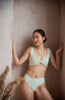 girl wearing mid rise high leg mint (honeydew) extra bum coverage bikini bottoms