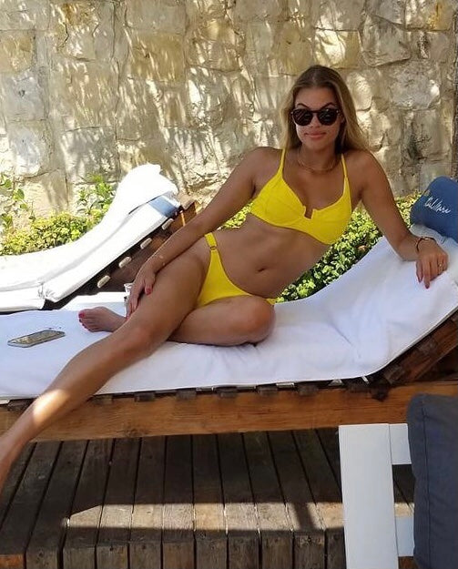 girl wearing yellow ribbed cheeky bikini bottoms