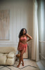 coral (pink) thigh length mesh sarong.